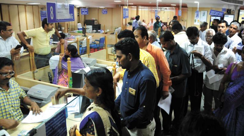Account holders gather in huge numbers as banks reopened on Thursday after a days closure. 	(Photo: ARUNCHANDRA BOSE)