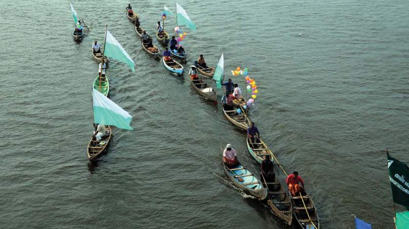 Activists of SC-ST Federation travel to Kochi Marine Drive in country boats on Friday  to commemorate the historic Kayal Struggle held in April 21, 1913. (Photo: ARUNCHANDRA BOSE)
