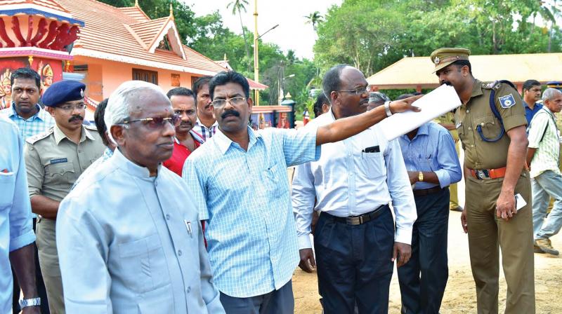 Justice P.S. Gopinathan (extreme left) inspects the site