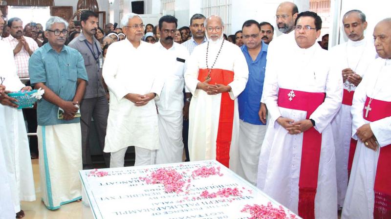 Bihar Chief Minister Nitish Kumar visits St Alphonsas tomb at Bharananganam in Kottayam along with Cardinal George Alencherry and other bishops on Friday ahead of the anti-liquor committee meeting. (Photo: Rajeev Prasad)