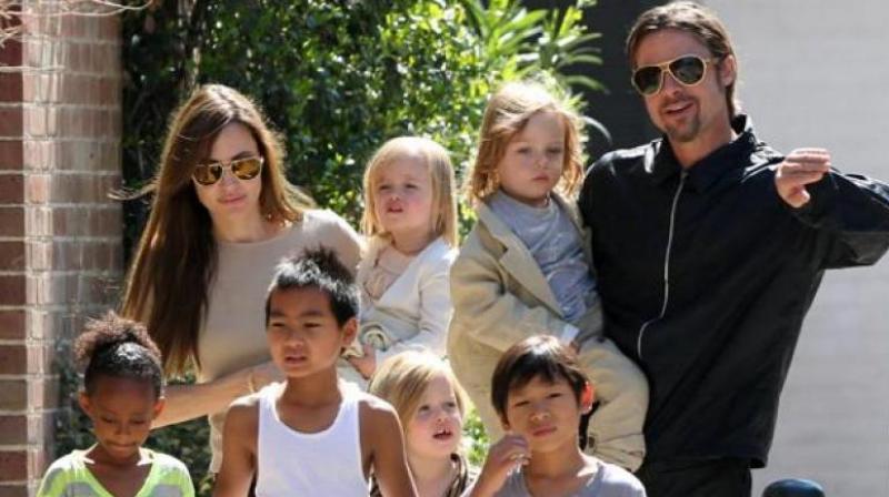 Angelina Jolie, Brad Pitt and their six kids before they split. (Photo: AP)