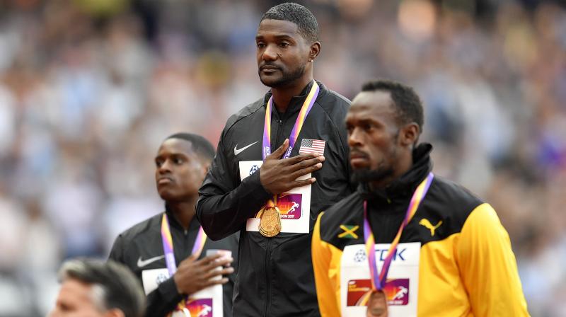 As soon as the announcer took gold-medal winning Justin Gatlins name, the crowd at the Olympic stadium booed the American. (Photo: AP)