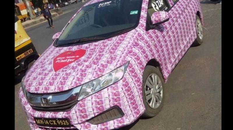 A man in Mumbai thought that plastering his car with Rs 2000 notes will be the best Valentines gift for his girlfriend. (Credit: YouTube)