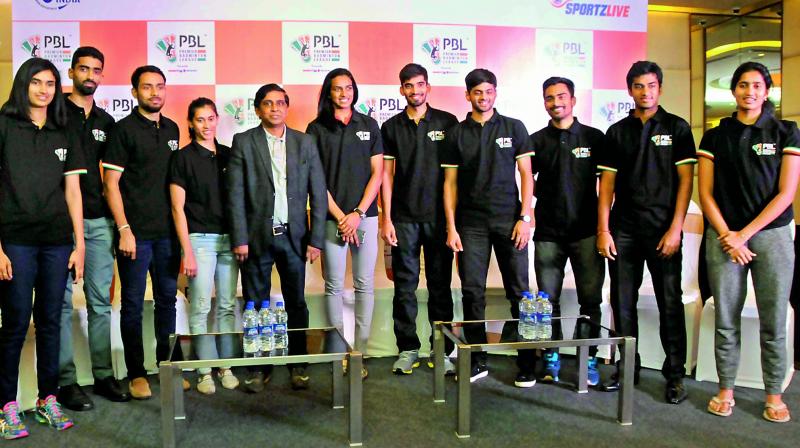 Olympic silver medallist P.V. Sindhu and other shuttlers pose at the press conference for the PBL Season 2 in Hyderabad on Friday.