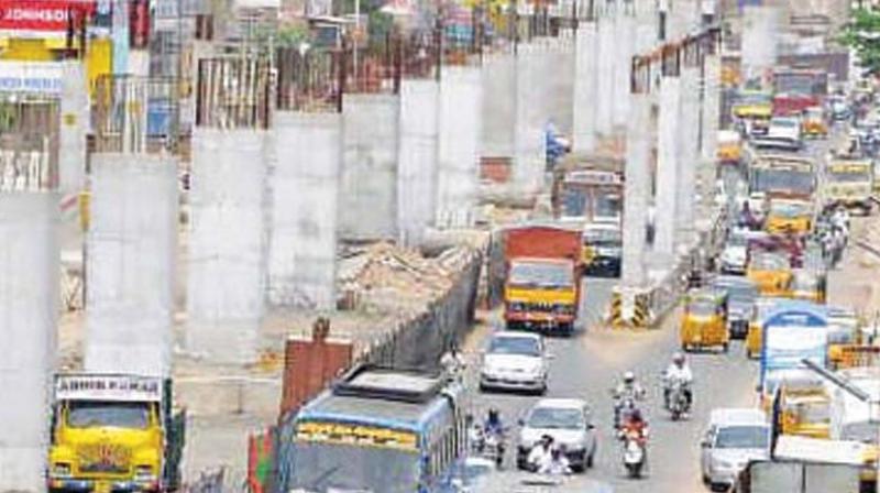 Pon Radhakrishnan  recalled various steps taken by the NHAI to revive the  project and his meeting with former CM Jayalalithaa and also with O. Panneerselvam