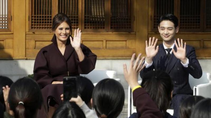 The video showed Trump at ease with South Korean teenagers in school uniforms at an event where the first lady gave a speech. (Photo: AP)