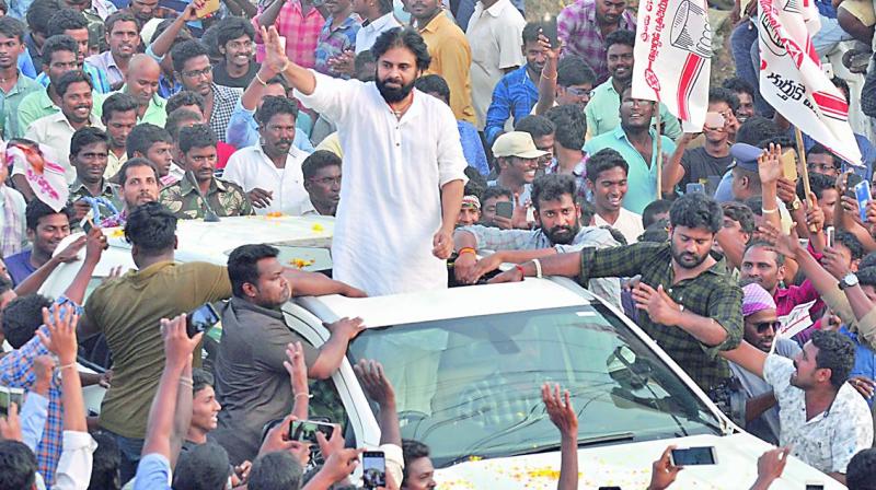 Jana Sena founder president K. Pawan Kalyan conducting a road show in Nellore city on Monday. (Photo: DC)