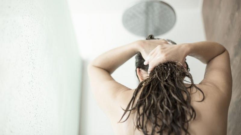 Drinking plenty of water helps to hydrate your hair (Photo: AFP)