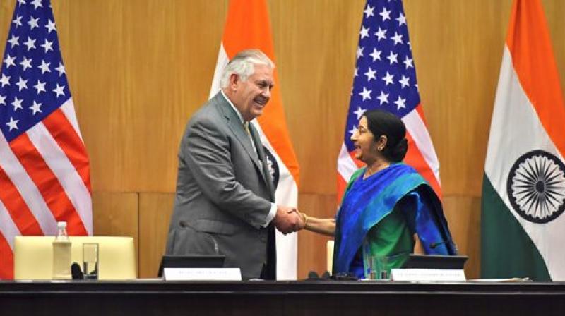 Minister for External Affairs Sushma Swaraj and US Secretary of State Rex Tillerson shake hands after their joint press conference in New Delhi on Wednesday. (Photo: PTI)