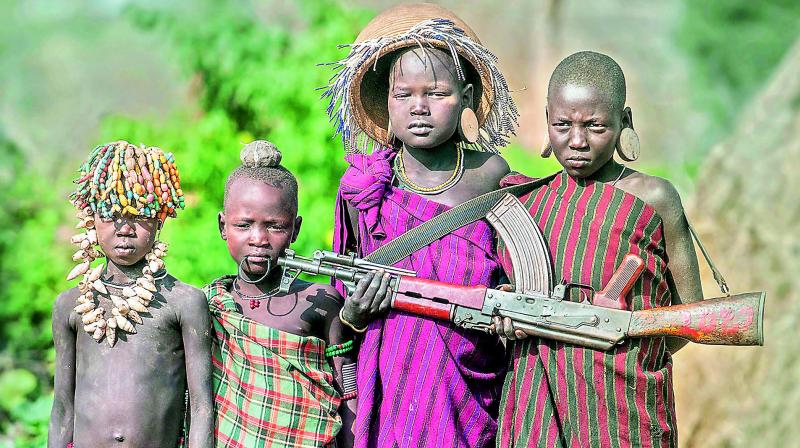 Gun and kids, Ethiopia