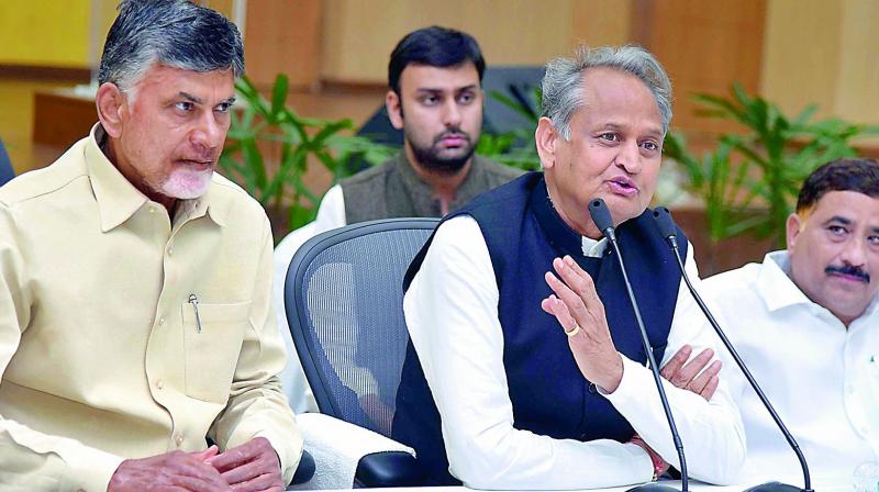 Andhra Pradesh Chief Minister N. Chandrababu Naidu with Congress leader and former chief minister of Rajasthan Ashok Gehlot addressing media in Amaravati on Saturday.