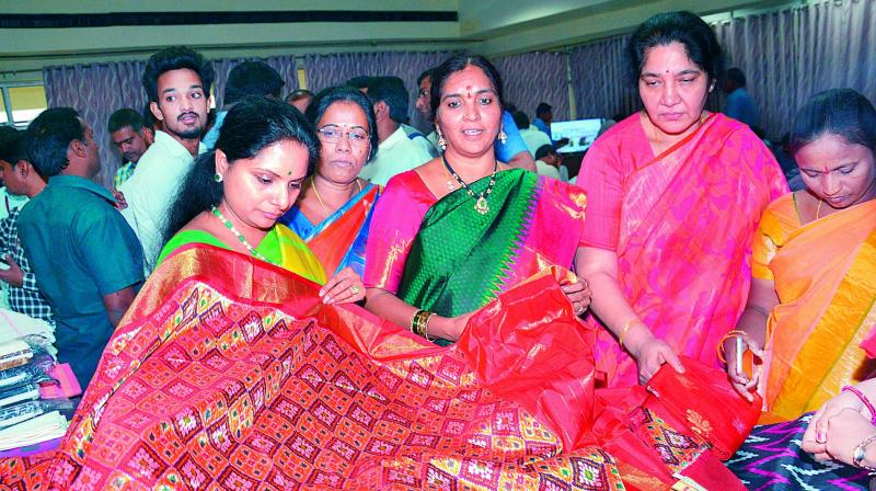 TRS MP K. Kavitha, who had come to the Assembly to greet Deputy Speaker Padma Devender Reddy on her birthday, invited some of the women legislators to the TSCO stall.