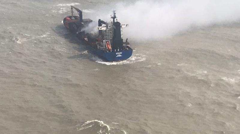 Navy restricts movement of merchant vessel on fire from drifting towards Bdesh