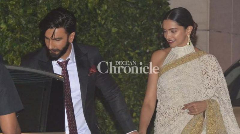 Ranveer Singh and Deepika padukone came out of Mukesh Ambanis party hand-in-hand, rubbishing rumours of break-up (Pic courtesy: Viral Bhayani).