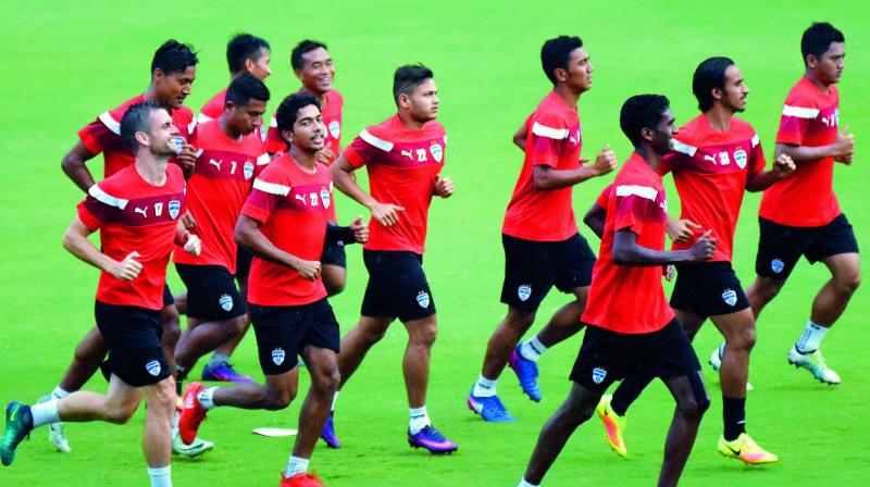 Bengaluru FC players warm-up during a training session. (Photo: DC)