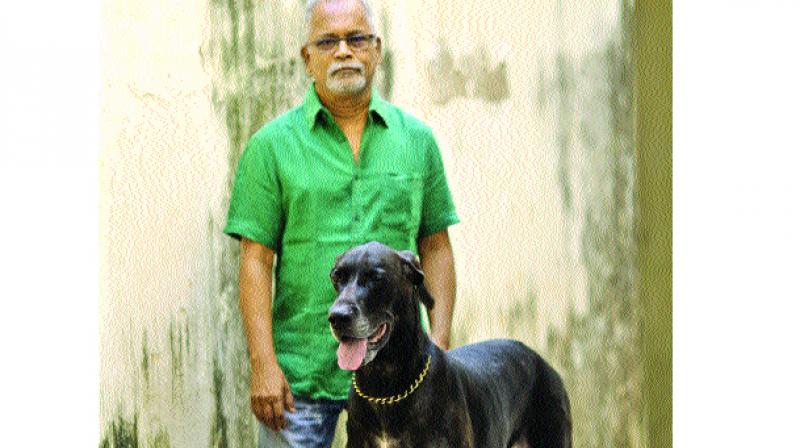 Charu Nivedita with his pet.