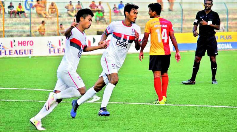 DSK Shivajians Jerry Mawihming-thanga (left) celebrates his goal.