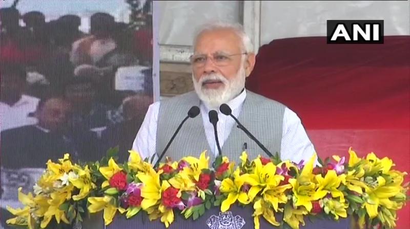 fter the inauguration, PM held a public address here claiming the progress by the Modi-led BJP government in Uttar Pradesh. (Photo: Twitter/ANI)