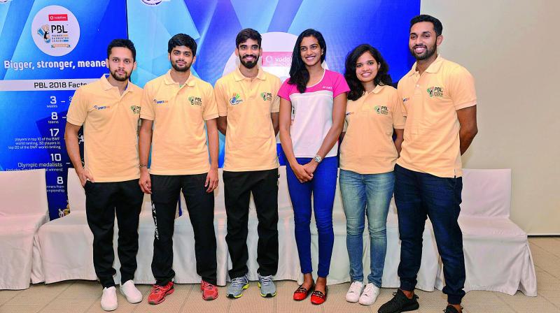 Shuttlers Parupalli Kashyap (from left), B. Sai Praneeth, Srikanth Kidambi, P.V. Sindhu, N. Sikki Reddy and H. S. Prannoy pose at the Premier Badminton League auction in Hyderabad on Monday.