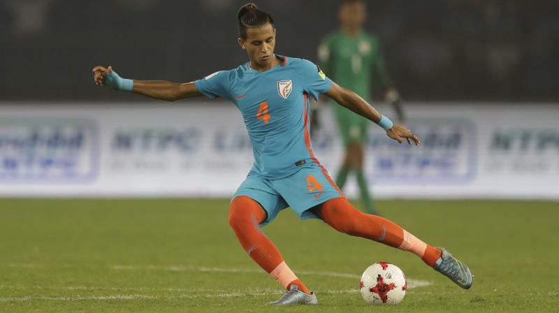 Indias Anwar Ali kicks the ball during the FIFA U-17 World Cup match against Colombia in New Delhi, India, Monday. (Photo: AP)