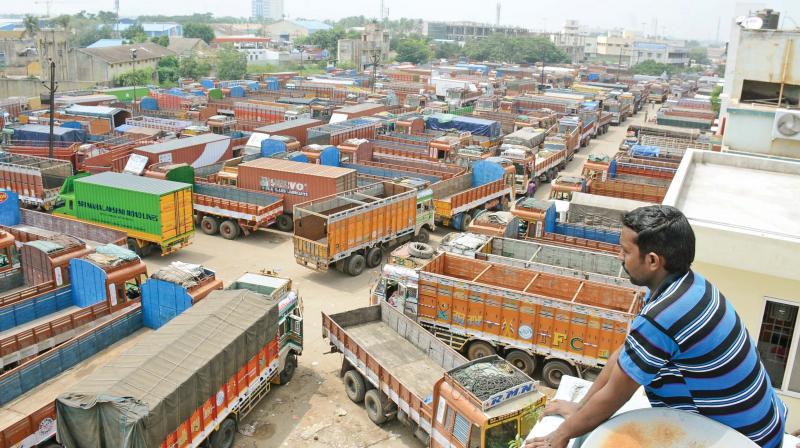 Hundreds of lorries parked at Madhavaram lorry shed due to the two-day strike against Goods and Services Tax (GST). Prices of essential commodities may go up ahead of Deepavali. (Photo: DC)