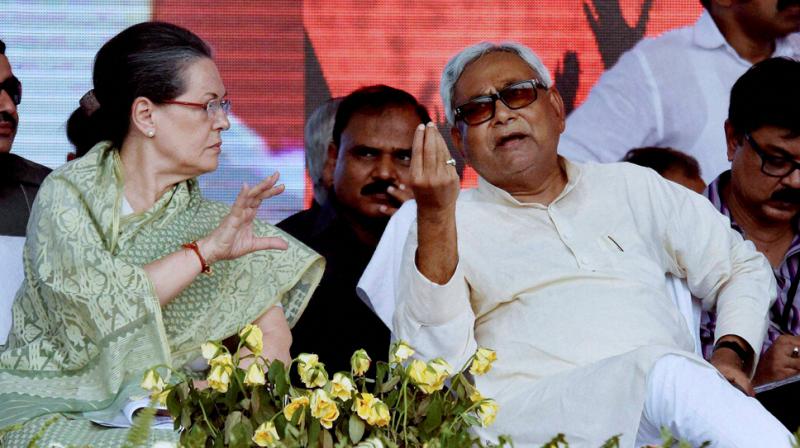 Congress President Sonia Gandhi and Bihar Chief Minister and JD(U) chief Nitish Kumar. (Photo: PTI)