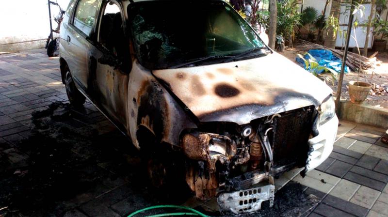 The partially burnt car of CPM Pulloni branch secy  E. Sreekumar	(Photo: DC)