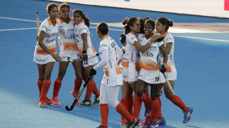 India discovered scoring ways to finally end Italys World Cup adventure through a field strike from Lalremsiami (20th minute) and two penalty corner goals from Neha Goyal (45th) and Vandana Katariya (55th) to register the emphatic win. (Photo: AP)