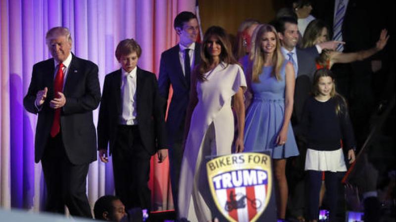 President-elect Donald Trump, left, followed by his family arrives at his election night rally. (Photo: AP)