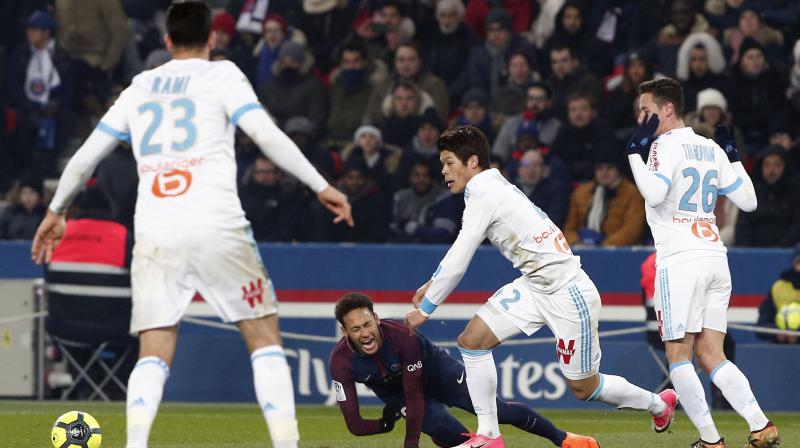 Neymar  suffered injury, as well as a twisted ankle, in an innocuous looking incident towards the end of Sundays 3-0 league victory over bitter rivals Marseille. (Photo: AP)