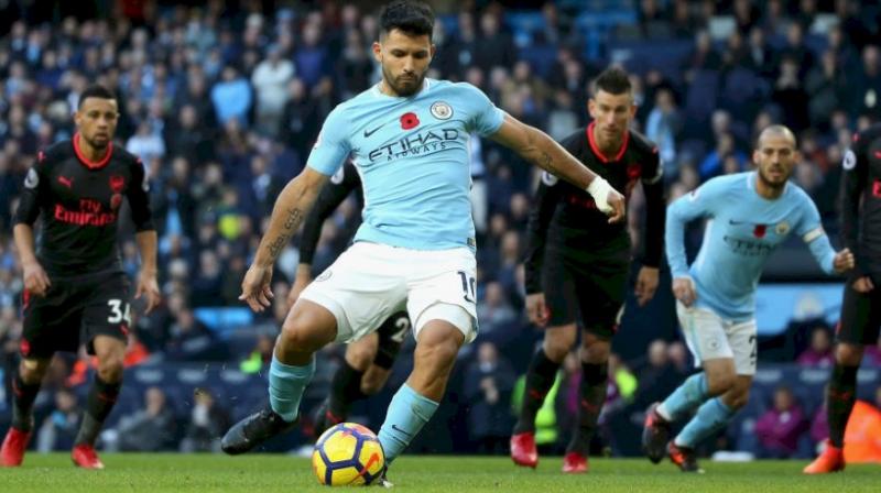 Sergio Aguero scored from penalty spot to give Manchester City lead against Arsena . (Photo:AP)