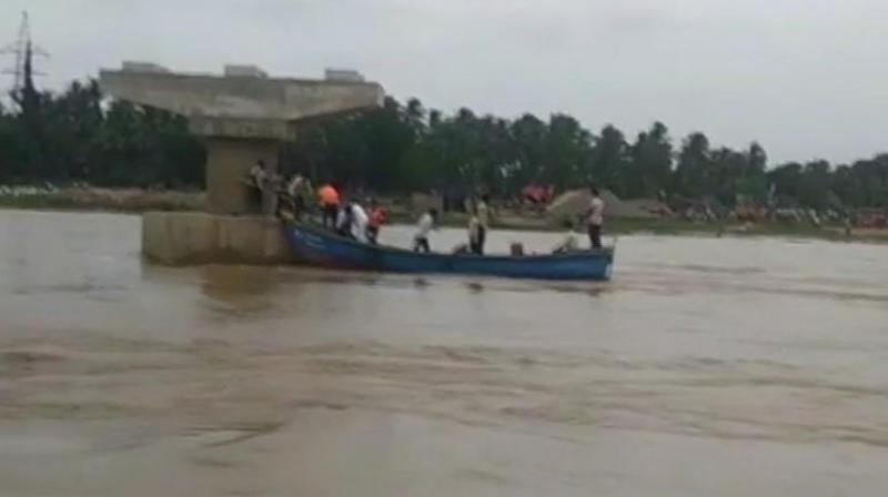 A Navy helicopter has been positioned at Rajamahendravaram for the search operation and it will be deployed once the weather clears, the State Disaster Management Authority said. (Photo: ANI/Twitter)