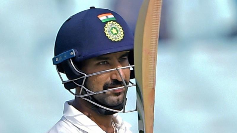 Cheteshwar Pujara became third Indian cricketer after ML Jaisimha and current India head coach Ravi Shastri to have batted on five days of a Test match. (Photo: PTI)