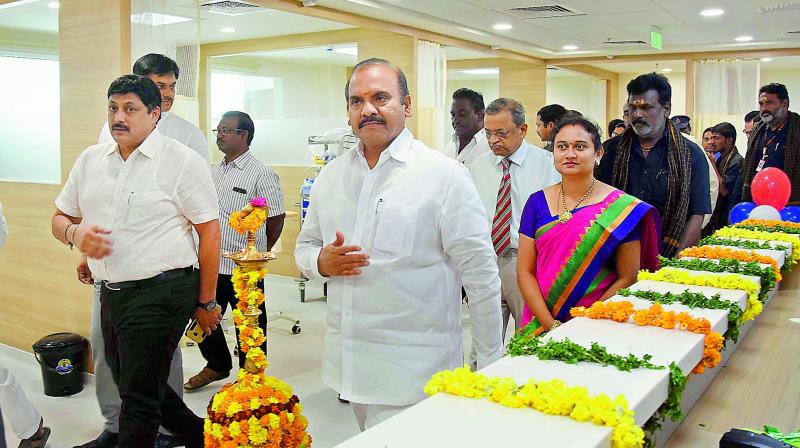 Minister P. Pullarao and NTR University V-C C.V. Rao take a look at the transplant and Medical ICU block after inauguration of Manipal Hospitals. (Photo: DC)