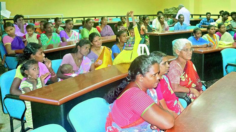 Ragpickers in and around Guntur city attend a meeting called by GMC additional commissioner K. Rama Chandra Reddy in Guntur on Wednesday. (Photo: DC)