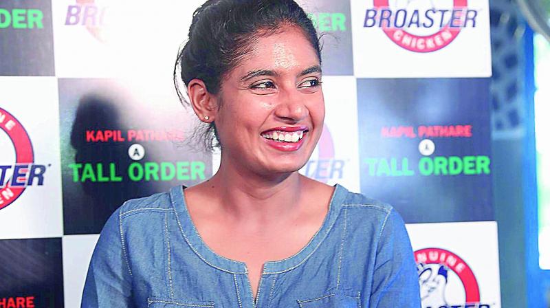 Mithali Raj reacts as she speaks about Indias chances at the womens World Cup during a book launch in Hyderabad.