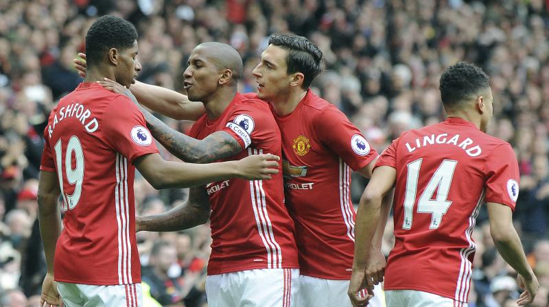 Marcus Rashford and Ander Herreras goals gave Manchester United a win that leaves Chelsea just four points above Tottenham Hotspur with six games to play. (Photo: AP)