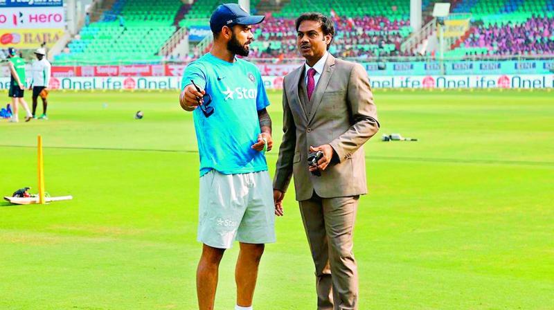 Virat Kohli and M.S.K. Prasad.