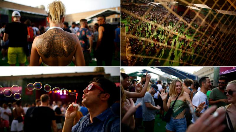 Revellers enjoy the sights and sounds at Spains Sonar Music Festival