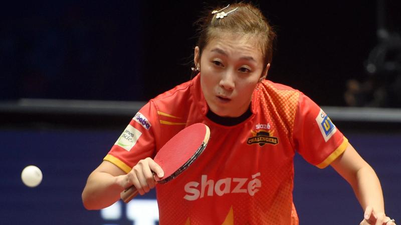 Shaze Challengers player Han Ying in action during CEAT Ultimate Table Tennis finals against Falcons TTC player Wu Yang in Mumbai on Sunday. (Photo: AP)