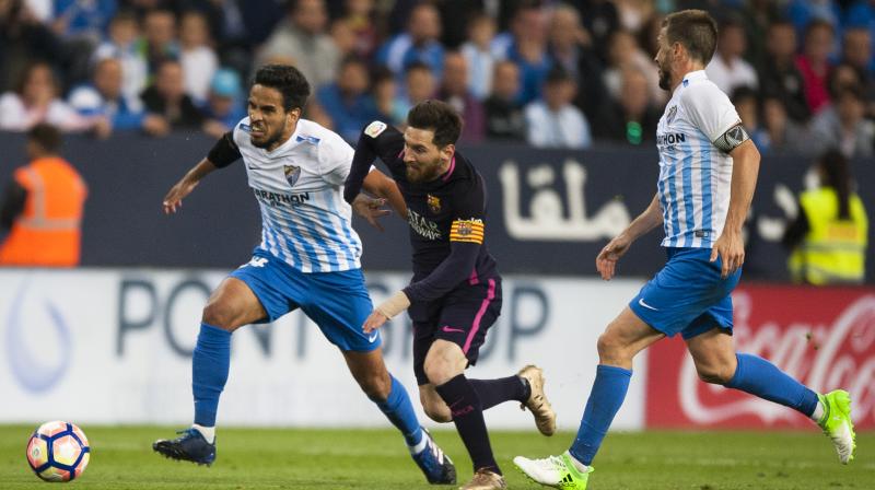 Malaga finally picked off the 10 men in the final minute when Pablo Fornals unselfishly squared for Jony to smash home from close range. (Photo: AP)