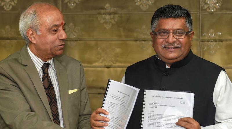 Justice B.N. Srikrishna and  IT Minister Ravi Shankar Prasad (Photo: PTI)