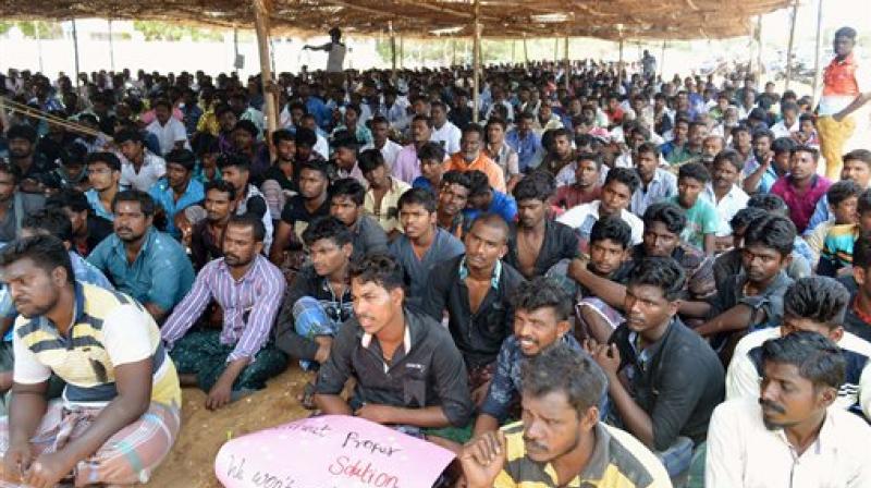 Fishermen community members on the 2nd day of their protest against the alleged killing 22-year-old Indian fisherman. (Photo: PTI)