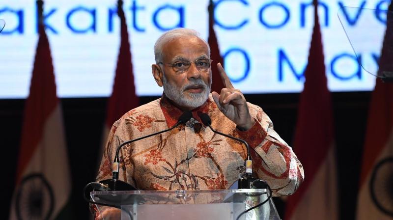 Prime Minister Narendra Modi addressed a gathering of Indian diaspora at the Jakarta Convention Centre in the Indonesian capital. (Photo: Twitter/@PIB_India)