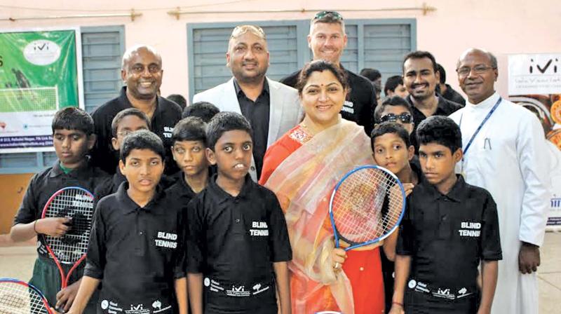 Actor and politician Khusbhu with tennis players.