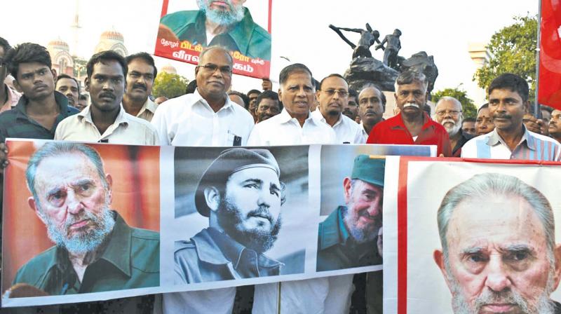 G. Ramakrishnan, state secretary of CPM, leads a silent rally after the death of Fidel Castro at Marina Beach on Saturday. (Photo: DC)