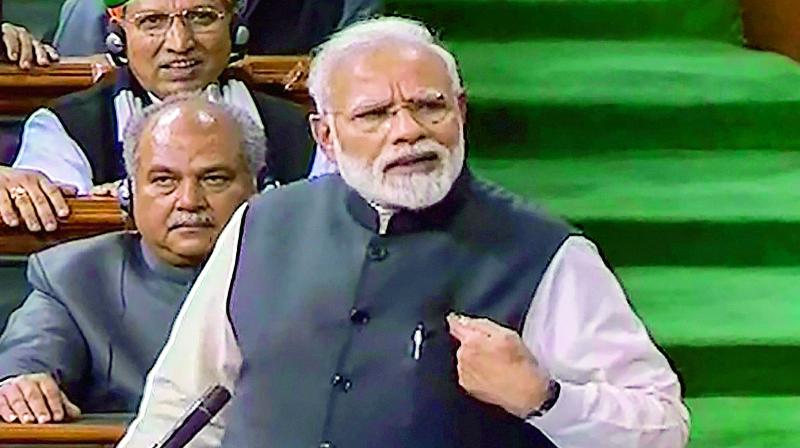 Prime Minister Narendra Modi addresses the Lok Sabha during the Budget Session of Parliament on Thursday.   (PTI)