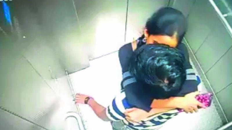 A screengrab of a video of a couple kissing in the lift of the Hyderabad Metro Rail. The clip has gone viral.