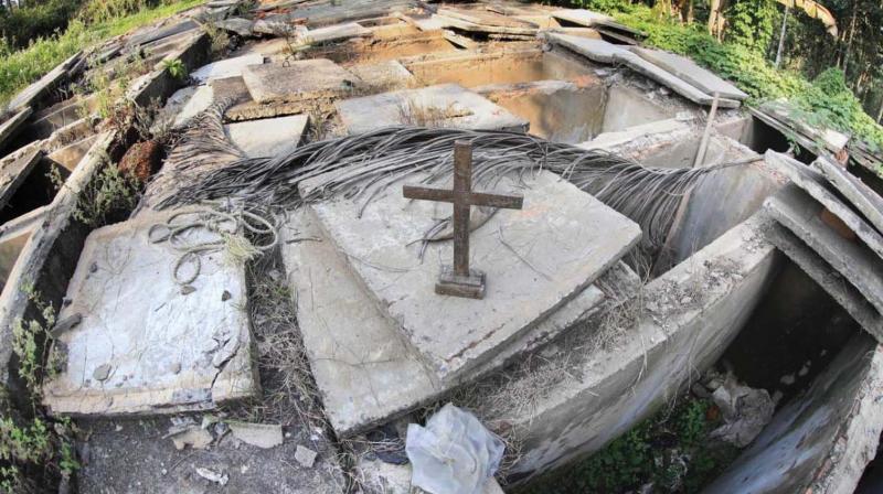 The vacant tombs at the cemetery of Little Flower Church, Pushpagiri, near Koodaranji in Kozhikode.