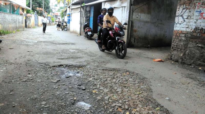 A dilapidated road at Vivekananda Nagar, Edappazhinji.	(Photo: DC)